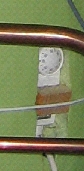 Image of hot water tank thermostat in situ